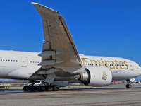 A Boeing 777-21H(LR) of Emirates begins the run for takeoff at Barcelona El Prat Airport in Barcelona, Spain, on October 8, 2024. (