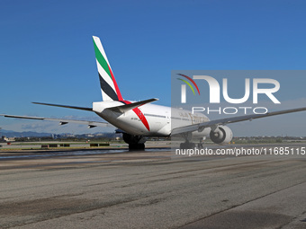 A Boeing 777-21H(LR) of Emirates begins the run for takeoff at Barcelona El Prat Airport in Barcelona, Spain, on October 8, 2024. (