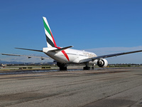 A Boeing 777-21H(LR) of Emirates begins the run for takeoff at Barcelona El Prat Airport in Barcelona, Spain, on October 8, 2024. (