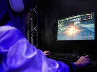 Gamers play video games at the Thailand Game Show 2024 in Bangkok, Thailand, on October 20, 2024. The Thailand Game Show 2024 gaming event t...