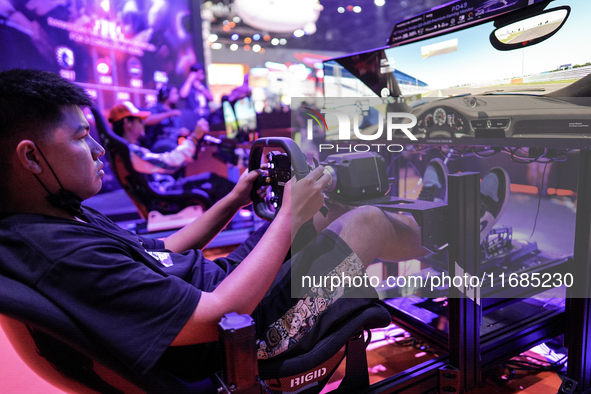 Gamers play video games at the Thailand Game Show 2024 in Bangkok, Thailand, on October 20, 2024. The Thailand Game Show 2024 gaming event t...