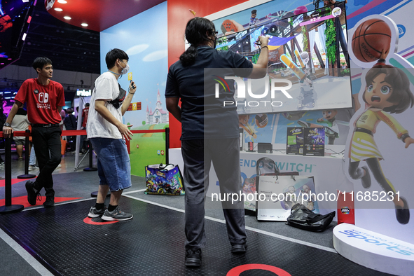 Gamers play video games with the Nintendo Switch at the Thailand Game Show 2024 in Bangkok, Thailand, on October 20, 2024. The Thailand Game...