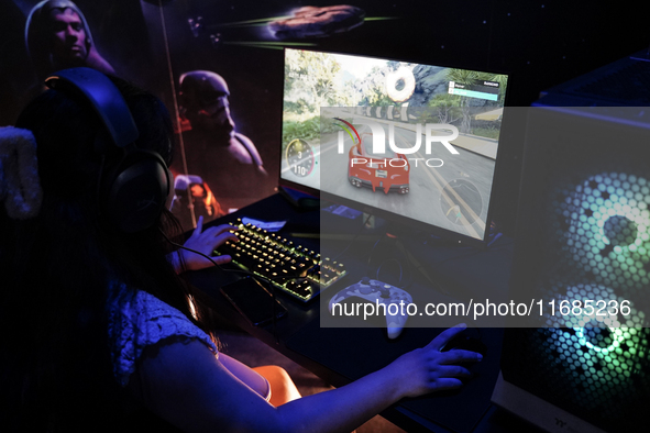 Gamers play video games at the Thailand Game Show 2024 in Bangkok, Thailand, on October 20, 2024. The Thailand Game Show 2024 gaming event t...