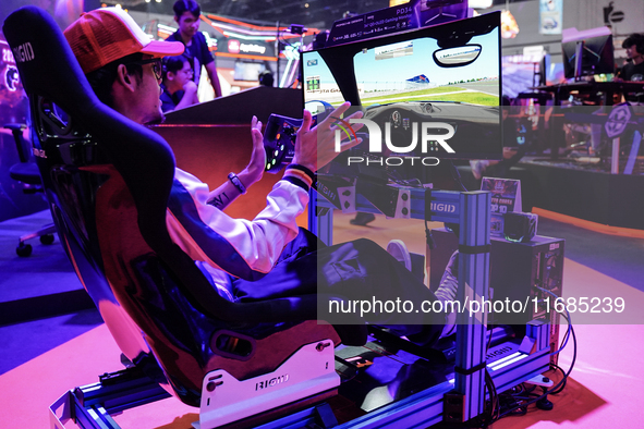 Gamers play video games at the Thailand Game Show 2024 in Bangkok, Thailand, on October 20, 2024. The Thailand Game Show 2024 gaming event t...