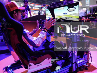 Gamers play video games at the Thailand Game Show 2024 in Bangkok, Thailand, on October 20, 2024. The Thailand Game Show 2024 gaming event t...