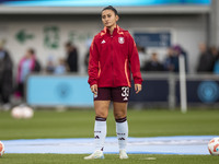 Mayumi Pacheco #33 of Aston Villa W.F.C participates in the pre-match warm-up during the Barclays FA Women's Super League match between Manc...