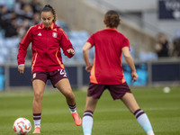 Chasity Grant #23 of Aston Villa W.F.C participates in the pre-match warm-up during the Barclays FA Women's Super League match between Manch...