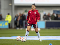 Mayumi Pacheco #33 of Aston Villa W.F.C participates in the pre-match warm-up during the Barclays FA Women's Super League match between Manc...