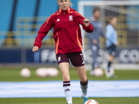 Missy Bo Kearns #7 of Aston Villa W.F.C participates in the pre-match warm-up during the Barclays FA Women's Super League match between Manc...