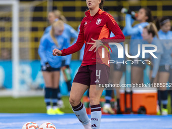 Anna Patten #4 of Aston Villa W.F.C participates in the pre-match warm-up during the Barclays FA Women's Super League match between Manchest...