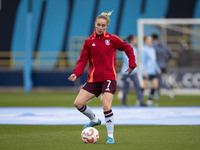 Missy Bo Kearns #7 of Aston Villa W.F.C participates in the pre-match warm-up during the Barclays FA Women's Super League match between Manc...