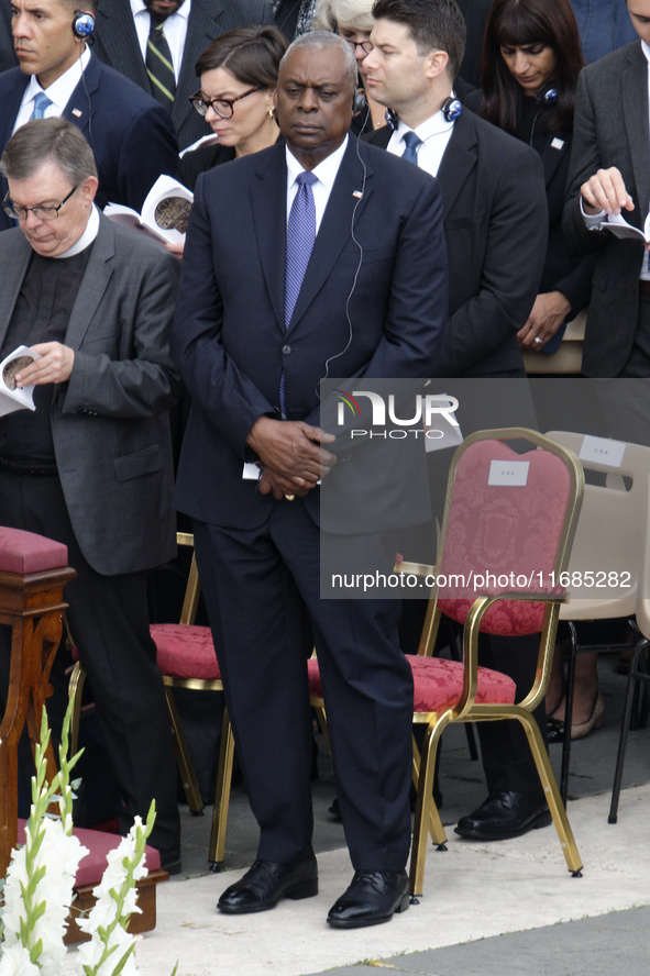 US Secretary of Defense Lloyd Austin (C) attends the Holy Mass and canonization of 14 saints and martyrs from Damascus at Saint Peter's Squa...