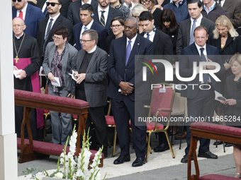 US Secretary of Defense Lloyd Austin (C) attends the Holy Mass and canonization of 14 saints and martyrs from Damascus at Saint Peter's Squa...