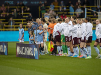 Teams shake hands during the Barclays FA Women's Super League match between Manchester City and Aston Villa at the Joie Stadium in Mancheste...