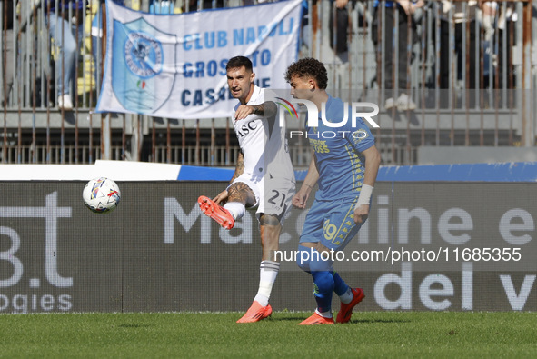 Matteo Politano of Napoli and Sebastiano Esposito of Empoli participate in the Serie A soccer match between Empoli FC and SSC Napoli at Stad...