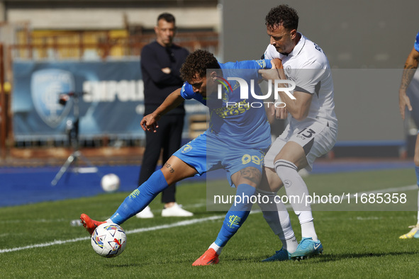 Empoli's Sebastiano Esposito and Napoli's Amir Rrahmani participate in the Serie A soccer match between Empoli FC and SSC Napoli at Stadio C...