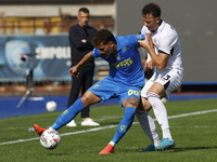 Empoli's Sebastiano Esposito and Napoli's Amir Rrahmani participate in the Serie A soccer match between Empoli FC and SSC Napoli at Stadio C...