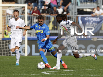 Napoli's Frank Zambo Anguissa and Empoli's Sebastiano Esposito play during the Serie A soccer match between Empoli FC and SSC Napoli at Stad...