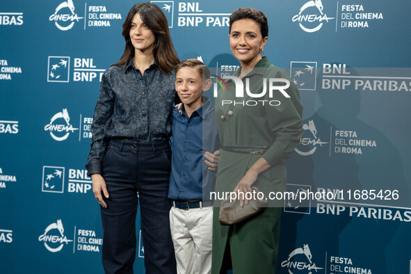 Barbara Ronchi, Christian Cervone, and Serena Rossi attend the ''Il Treno Dei Bambini'' photocall during the 19th Rome Film Festival at Audi...