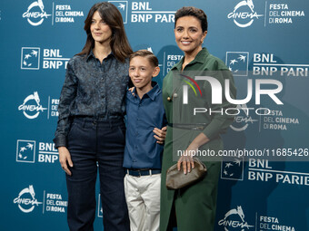 Barbara Ronchi, Christian Cervone, and Serena Rossi attend the ''Il Treno Dei Bambini'' photocall during the 19th Rome Film Festival at Audi...