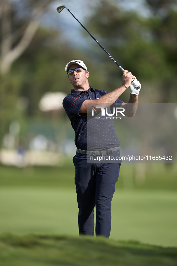 In San Roque, Spain, on October 12, 2024, Julien Guerrier of France plays his second shot on the 2nd hole on the fourth day of the Estrella...