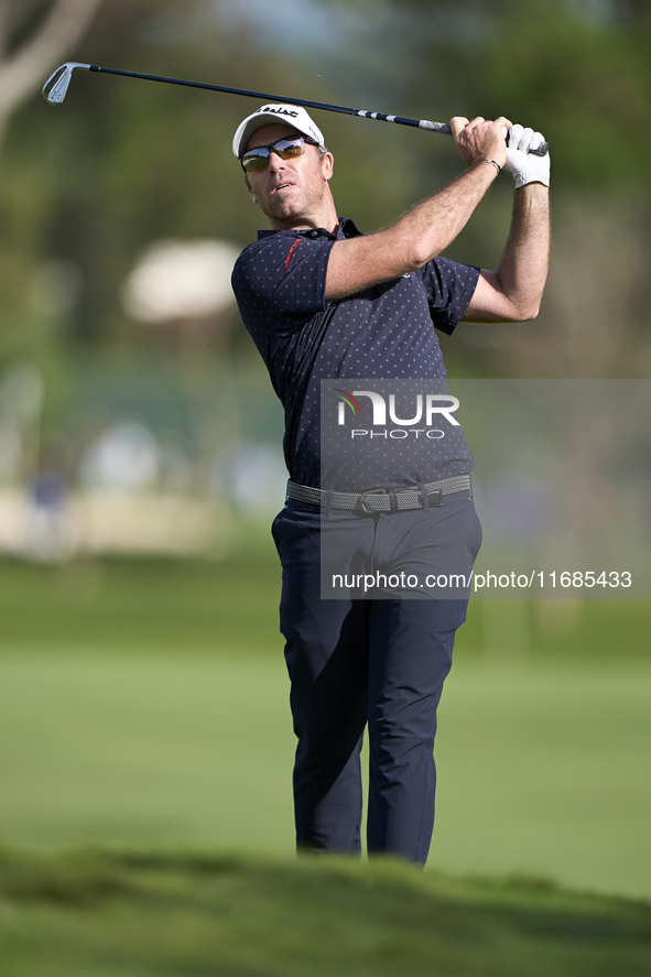 In San Roque, Spain, on October 12, 2024, Julien Guerrier of France plays his second shot on the 2nd hole on the fourth day of the Estrella...