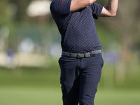 In San Roque, Spain, on October 12, 2024, Julien Guerrier of France plays his second shot on the 2nd hole on the fourth day of the Estrella...