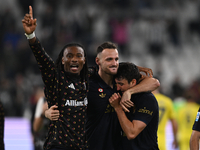 Khephren Thuram of Juventus FC, Federico Gatti of Juventus FC, and Andrea Cambiaso of Juventus FC celebrate after winning during the Juventu...