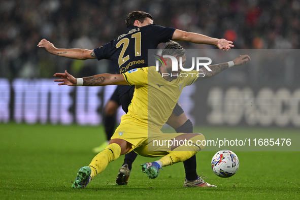 Gustav Isaksen of SS Lazio and Nicolo Fagioli of Juventus FC battle for the ball during the Juventus FC vs. SS Lazio match, the 8th turn of...