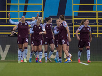 Teams shake hands during the Barclays FA Women's Super League match between Manchester City and Aston Villa at the Joie Stadium in Mancheste...