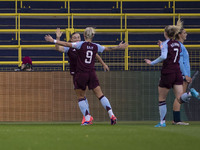 Teams shake hands during the Barclays FA Women's Super League match between Manchester City and Aston Villa at the Joie Stadium in Mancheste...