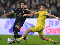 Nicolo Fagioli of Juventus FC and Patric of SS Lazio battle for the ball during the Juventus FC vs. SS Lazio match in the 8th round of the I...