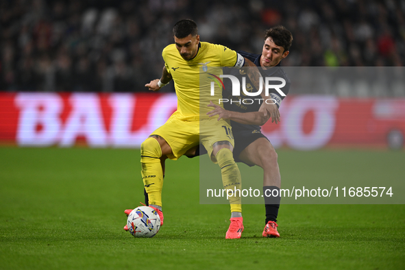 Mattia Zaccagni of SS Lazio and Andrea Cambiaso of Juventus FC battle for the ball during the Juventus FC vs. SS Lazio match, the 8th round...