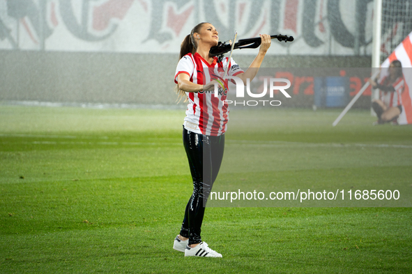 Violinist Agnieszka Matusik performs before the game between KS Cracovia and Lech Poznan in Krakow, Poland, on October 19, 2024, during the...