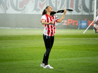 Violinist Agnieszka Matusik performs before the game between KS Cracovia and Lech Poznan in Krakow, Poland, on October 19, 2024, during the...