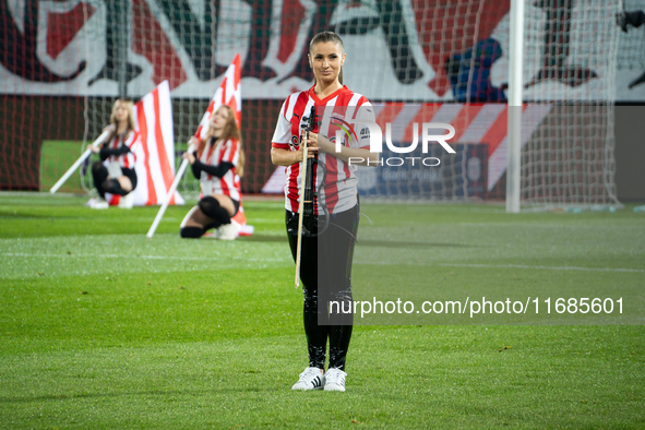 Violinist Agnieszka Matusik performs before the game between KS Cracovia and Lech Poznan in Krakow, Poland, on October 19, 2024, during the...