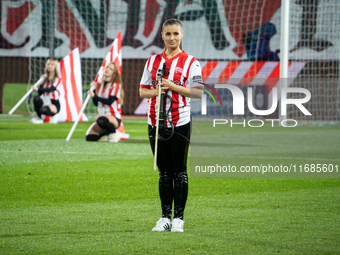 Violinist Agnieszka Matusik performs before the game between KS Cracovia and Lech Poznan in Krakow, Poland, on October 19, 2024, during the...