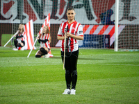 Violinist Agnieszka Matusik performs before the game between KS Cracovia and Lech Poznan in Krakow, Poland, on October 19, 2024, during the...