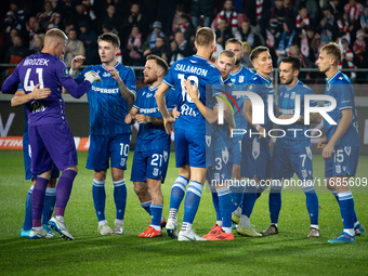 Lech Poznan players celebrate scoring a goal in a game between KS Cracovia and Lech Poznan in Krakow, Poland, on October 19, 2024. This is a...