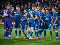 Lech Poznan players celebrate scoring a goal in a game between KS Cracovia and Lech Poznan in Krakow, Poland, on October 19, 2024. This is a...