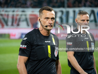 Referee Jaroslaw Przybyl officiates the game between KS Cracovia and Lech Poznan in Krakow, Poland, on October 19, 2024, during the PKO BP E...