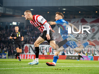 David Olafsson and Dino Hotic participate in the game between KS Cracovia and Lech Poznan in Krakow, Poland, on October 19, 2024. PKO BP Eks...