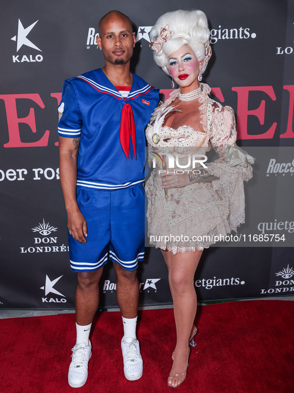 Joseph Boykin and Amber Rose arrive at Amberween - An Amber Rose Birthday Party held at a Private Residence on October 19, 2024 in Tarzana,...