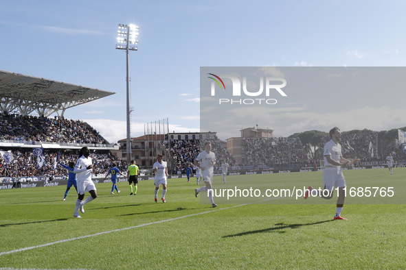 Napoli's Khvicha Kvaratskhelia celebrates after scoring their first goal during the Serie A soccer match between Empoli FC and SSC Napoli at...