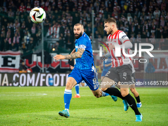 Mikael Ishak and Arttu Hoskonen participate in the game between KS Cracovia and Lech Poznan in Krakow, Poland, on October 19, 2024. This is...