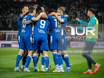 Lech Poznan players celebrate scoring a goal during the game between KS Cracovia and Lech Poznan in Krakow, Poland, on October 19, 2024, in...