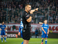 Referee Jaroslaw Przybyl officiates the game between KS Cracovia and Lech Poznan in Krakow, Poland, on October 19, 2024, during the PKO BP E...