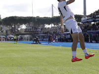 Napoli's Khvicha Kvaratskhelia celebrates after scoring their first goal during the Serie A soccer match between Empoli FC and SSC Napoli at...