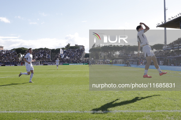 Napoli's Khvicha Kvaratskhelia celebrates after scoring their first goal during the Serie A soccer match between Empoli FC and SSC Napoli at...