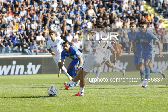 Napoli's Khvicha Kvaratskhelia scores their first goal on a penalty during the Serie A soccer match between Empoli FC and SSC Napoli at Stad...